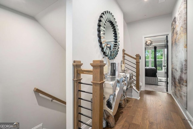 2505 Astaire Ct NW, Atlanta, GA 30318 - hall with an upstairs landing, wood finished floors, and baseboards