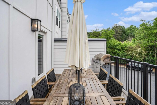 2505 Astaire Ct NW, Atlanta, GA 30318 - wooden terrace with area for grilling