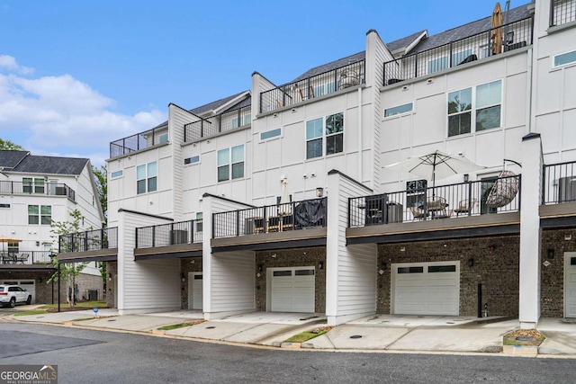 2505 Astaire Ct NW, Atlanta, GA 30318 - view of front of property with a garage and driveway