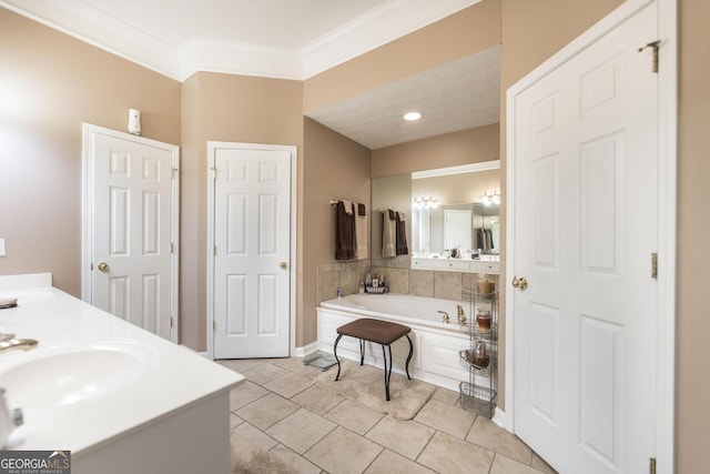 full bathroom featuring a garden tub, ornamental molding, tile patterned flooring, and double vanity