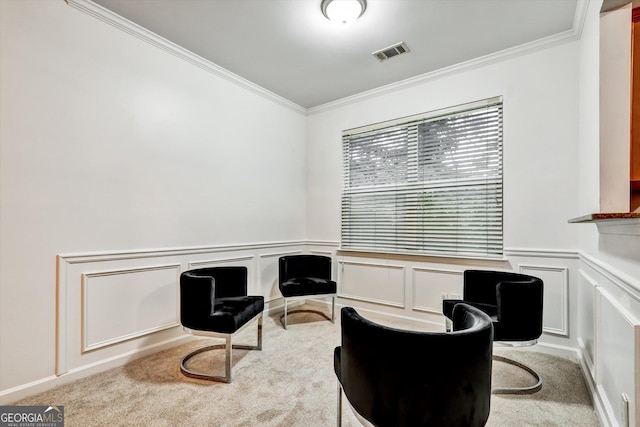 547 SE Tufton Trl SE, Atlanta, GA 30354 - sitting room with crown molding, carpet floors, a decorative wall, and a wainscoted wall