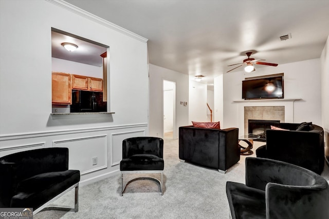 547 SE Tufton Trl SE, Atlanta, GA 30354 - carpeted living room with ceiling fan and a tile fireplace