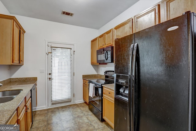 547 SE Tufton Trl SE, Atlanta, GA 30354 - kitchen featuring black appliances and light stone countertops