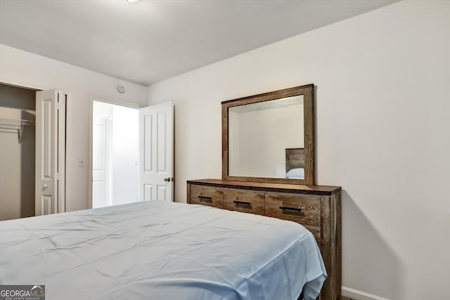 547 SE Tufton Trl SE, Atlanta, GA 30354 - bedroom featuring baseboards and a closet