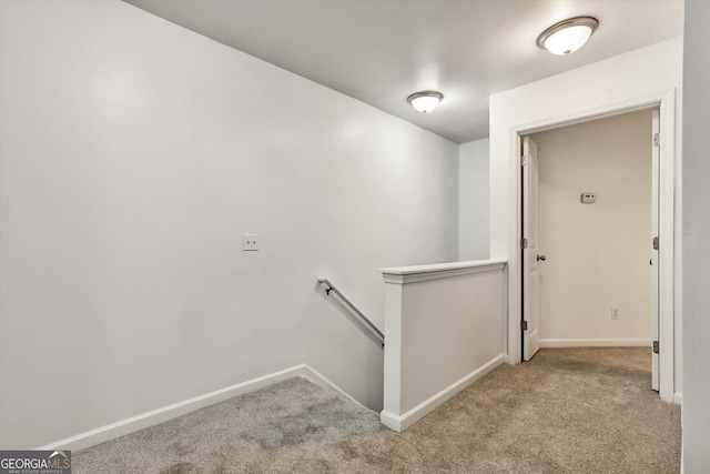 547 SE Tufton Trl SE, Atlanta, GA 30354 - hallway featuring an upstairs landing and carpet floors