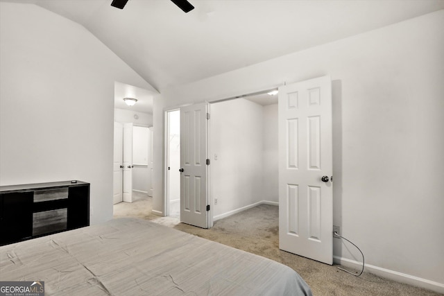 547 SE Tufton Trl SE, Atlanta, GA 30354 - bedroom with vaulted ceiling, light carpet, and a ceiling fan
