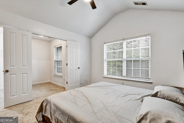 547 SE Tufton Trl SE, Atlanta, GA 30354 - carpeted bedroom with vaulted ceiling and a ceiling fan