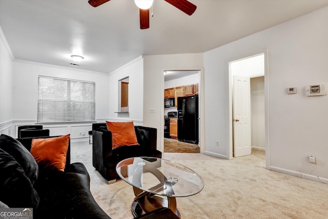 547 SE Tufton Trl SE, Atlanta, GA 30354 - living room with a ceiling fan, light carpet, and crown molding