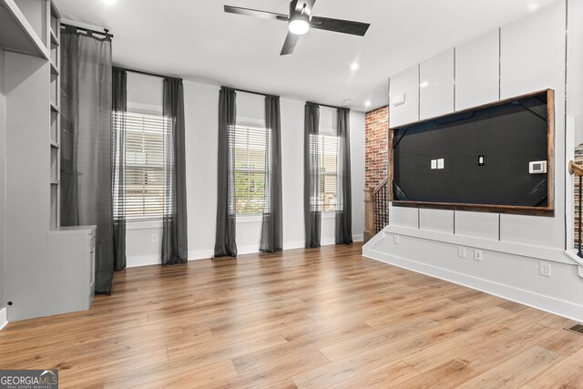 4462 Dandelion Ln, Atlanta, GA 30342 - unfurnished living room featuring ceiling fan, light wood-type flooring, recessed lighting, and baseboards