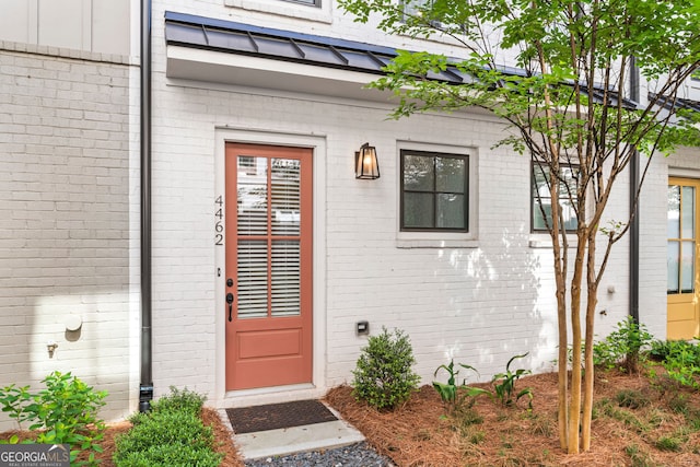 4462 Dandelion Ln, Atlanta, GA 30342 - doorway to property featuring brick siding