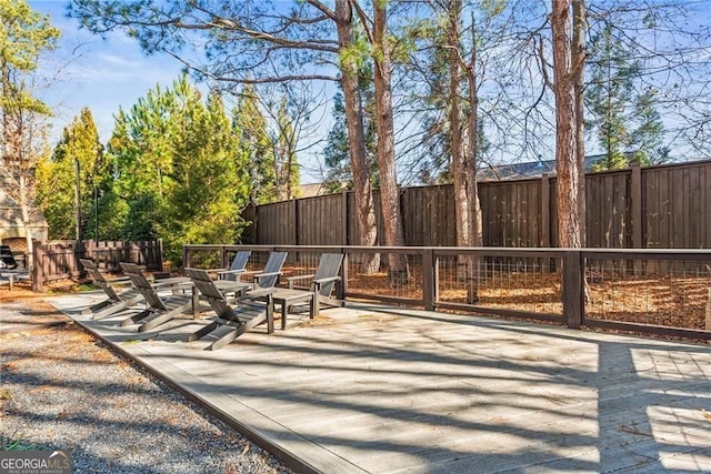 4462 Dandelion Ln, Atlanta, GA 30342 - view of patio featuring fence