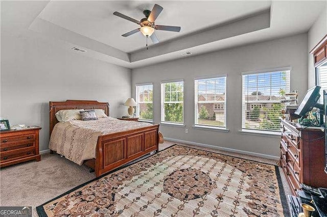 6237 Thorncrest Dr Unit 10, Tucker, GA 30084 - bedroom featuring a raised ceiling, baseboards, ceiling fan, and light carpet