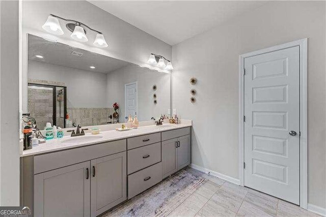 6237 Thorncrest Dr Unit 10, Tucker, GA 30084 - full bath featuring double vanity, baseboards, and tile patterned flooring