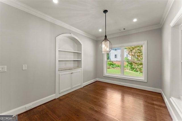 5816 Chamblee Dunwoody, Atlanta, GA 30338 - unfurnished dining area featuring a chandelier, baseboards, dark wood finished floors, recessed lighting, and built in shelves