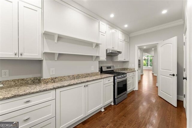 5816 Chamblee Dunwoody, Atlanta, GA 30338 - kitchen featuring stainless steel range with gas cooktop, under cabinet range hood, open shelves, crown molding, and white cabinets