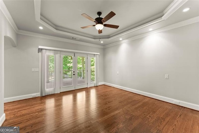 5816 Chamblee Dunwoody, Atlanta, GA 30338 - spare room with a raised ceiling, french doors, ceiling fan, wood finished floors, and crown molding