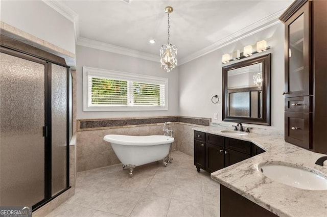 5816 Chamblee Dunwoody, Atlanta, GA 30338 - bathroom featuring a stall shower, double vanity, tile walls, ornamental molding, and tile patterned flooring