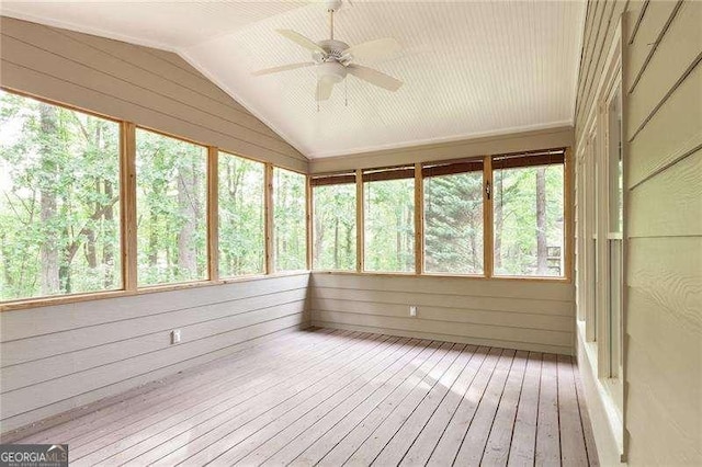 5065 Hickory Hills Dr, Woodstock, GA 30188 - unfurnished sunroom featuring a ceiling fan, lofted ceiling, hardwood / wood-style floors, and wood walls