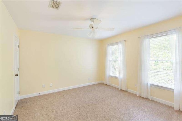 5065 Hickory Hills Dr, Woodstock, GA 30188 - carpeted spare room with baseboards and ceiling fan