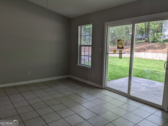 6260 Marbut Farms Ter, Lithonia, GA 30058 - entryway featuring light tile patterned flooring and baseboards