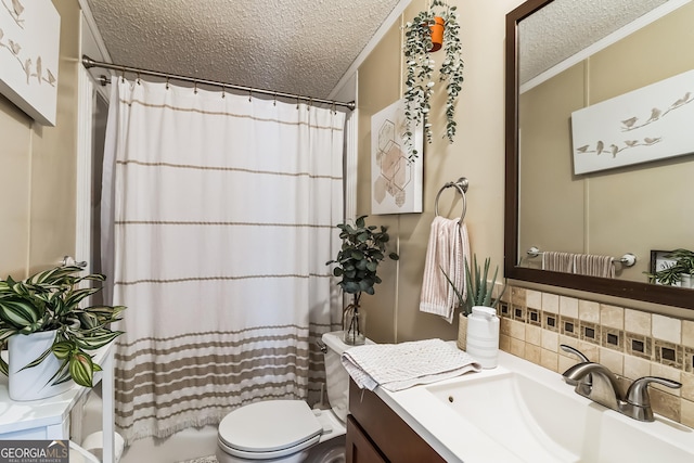 full bathroom with a textured ceiling, tasteful backsplash, vanity, toilet, and a shower with curtain