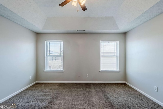 1436 Arbor Place Dr, Morrow, GA 30260 - empty room with carpet floors, a raised ceiling, a ceiling fan, and baseboards