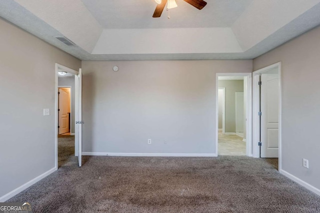 1436 Arbor Place Dr, Morrow, GA 30260 - carpeted empty room with a tray ceiling, ceiling fan, and baseboards