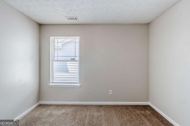 1436 Arbor Place Dr, Morrow, GA 30260 - carpeted empty room featuring healthy amount of natural light, baseboards, and a textured ceiling
