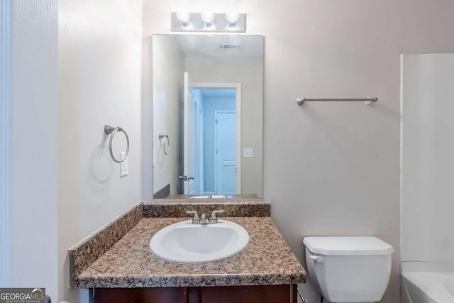 1436 Arbor Place Dr, Morrow, GA 30260 - bathroom featuring vanity, toilet, and  shower combination