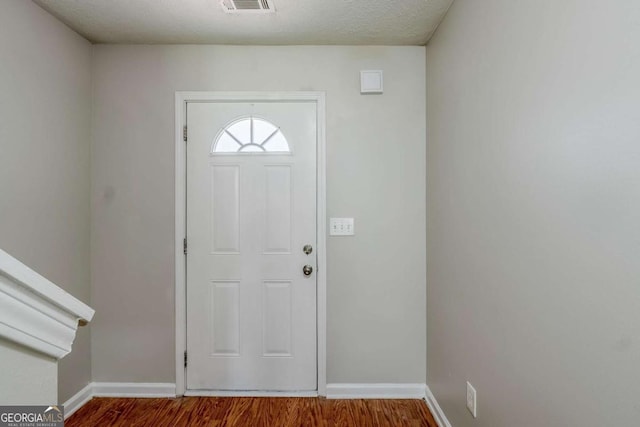 1436 Arbor Place Dr, Morrow, GA 30260 - foyer entrance featuring wood finished floors and baseboards