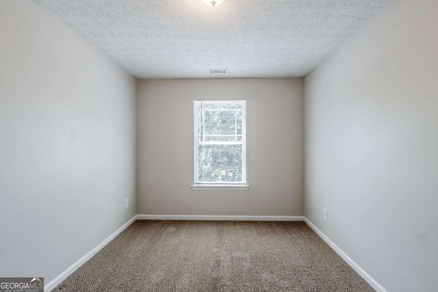 1436 Arbor Place Dr, Morrow, GA 30260 - empty room featuring carpet floors, baseboards, and a textured ceiling