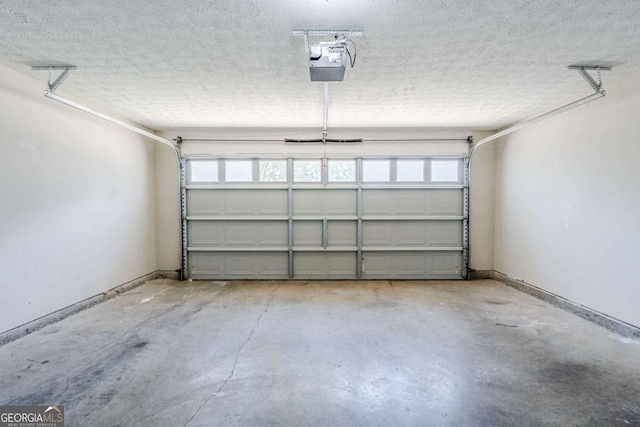 1436 Arbor Place Dr, Morrow, GA 30260 - garage with a garage door opener and baseboards
