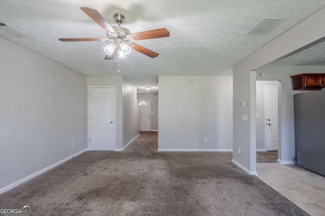 1436 Arbor Place Dr, Morrow, GA 30260 - unfurnished room featuring a ceiling fan, light colored carpet, a textured ceiling, and baseboards