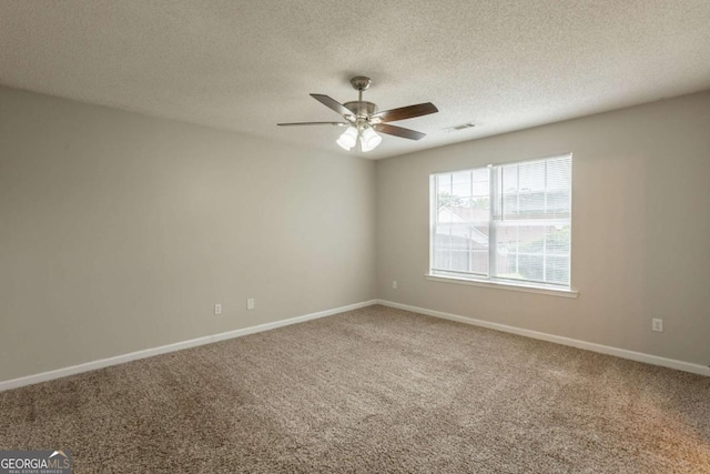 3531 Brookstone Way, Union City, GA 30291 - spare room with carpet flooring, a ceiling fan, baseboards, and a textured ceiling