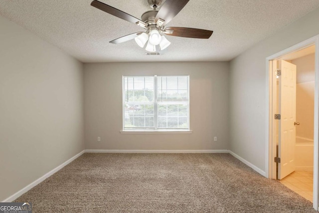 3531 Brookstone Way, Union City, GA 30291 - empty room with carpet floors, ceiling fan, a textured ceiling, and baseboards