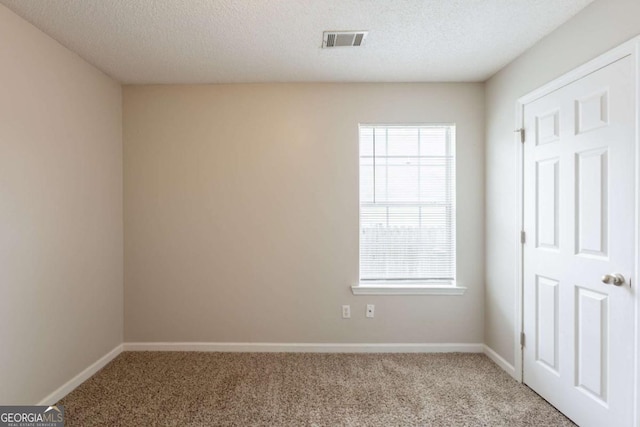3531 Brookstone Way, Union City, GA 30291 - carpeted empty room featuring plenty of natural light, baseboards, and a textured ceiling
