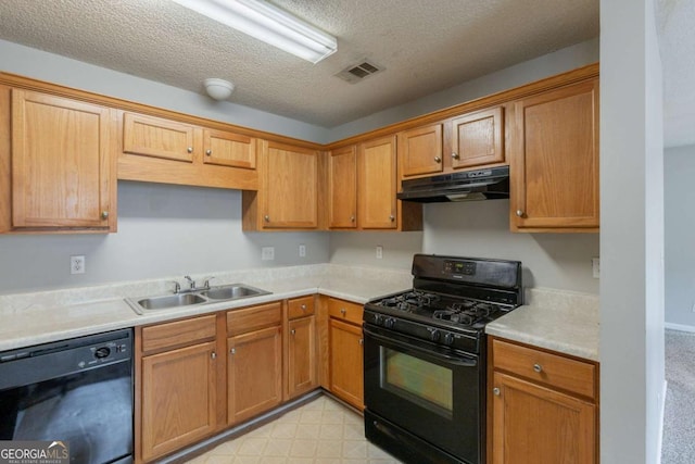 3531 Brookstone Way, Union City, GA 30291 - kitchen with black appliances, under cabinet range hood, a sink, light countertops, and a textured ceiling