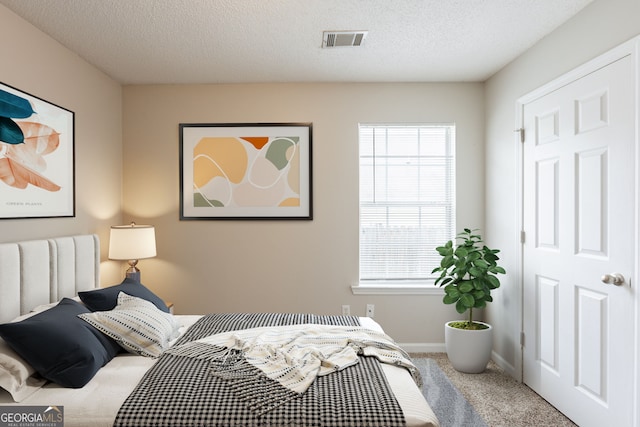 3531 Brookstone Way, Union City, GA 30291 - bedroom featuring carpet floors, baseboards, and a textured ceiling
