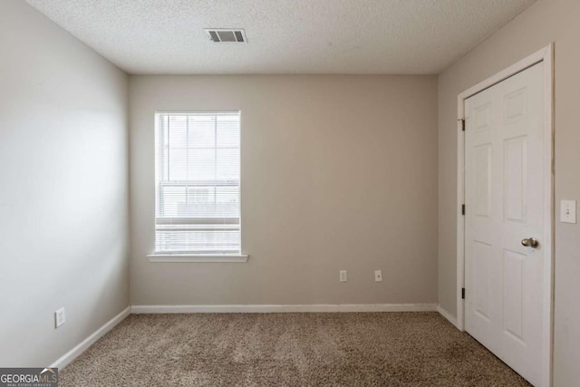 3531 Brookstone Way, Union City, GA 30291 - carpeted empty room with healthy amount of natural light, a textured ceiling, and baseboards