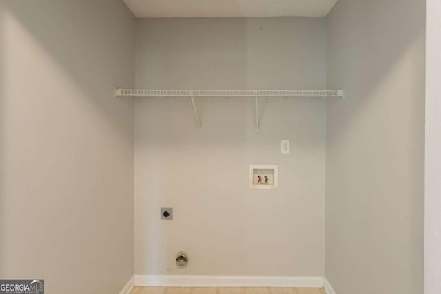 3531 Brookstone Way, Union City, GA 30291 - clothes washing area featuring electric dryer hookup, washer hookup, and baseboards