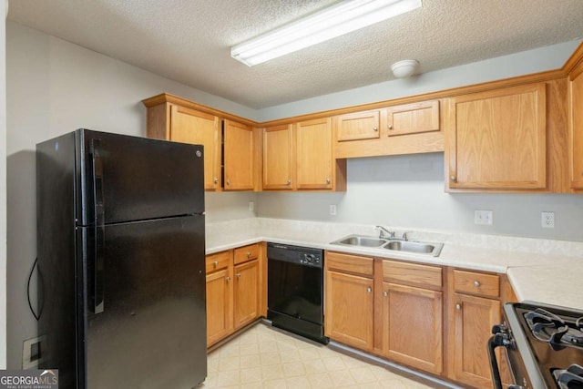3531 Brookstone Way, Union City, GA 30291 - kitchen with black appliances, light countertops, a textured ceiling, and light floors