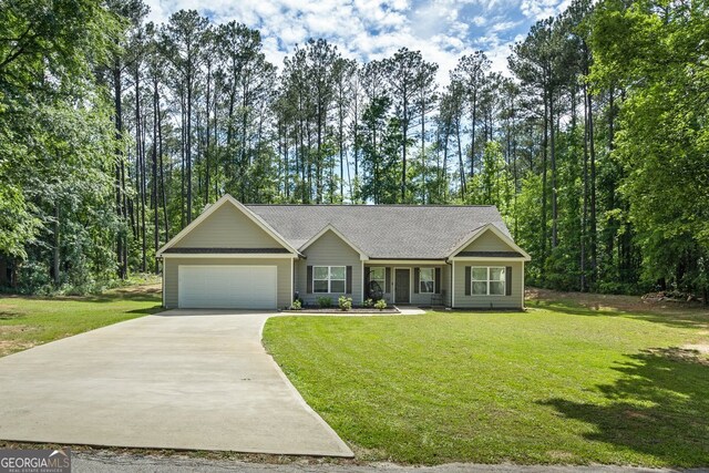 121 Bob Cat Trl, Mansfield, GA 30055 - ranch-style house with a garage, driveway, a front lawn, and a shingled roof