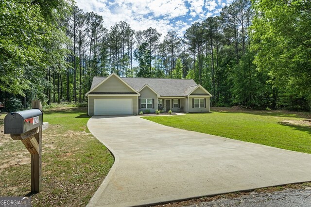 121 Bob Cat Trl, Mansfield, GA 30055 - single story home featuring concrete driveway, an attached garage, and a front lawn