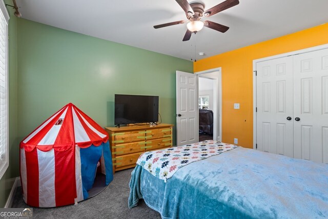 121 Bob Cat Trl, Mansfield, GA 30055 - bedroom with carpet flooring, a closet, and a ceiling fan