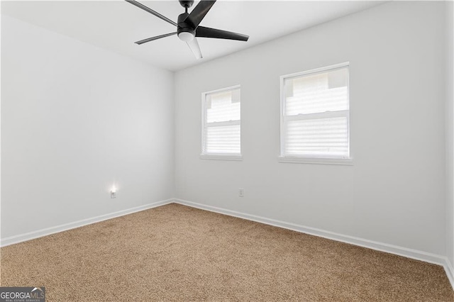 994 Byron Dr SW, Atlanta, GA 30310 - carpeted empty room with ceiling fan and baseboards