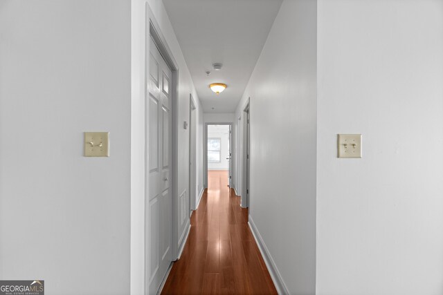 1102 Madison Ln SE, Smyrna, GA 30080 - hall featuring dark wood-type flooring and baseboards