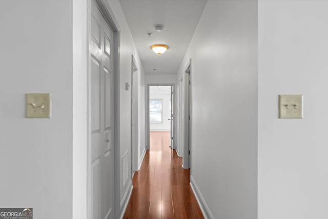 1102 Madison Ln SE, Smyrna, GA 30080 - corridor with dark wood-type flooring and baseboards