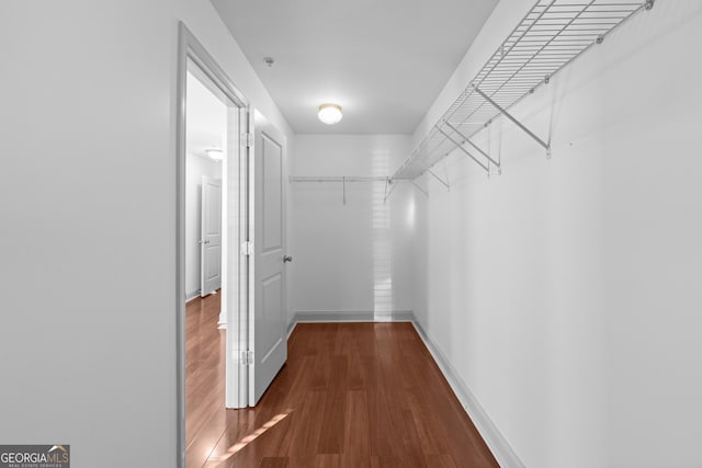 1102 Madison Ln SE, Smyrna, GA 30080 - spacious closet with dark wood finished floors