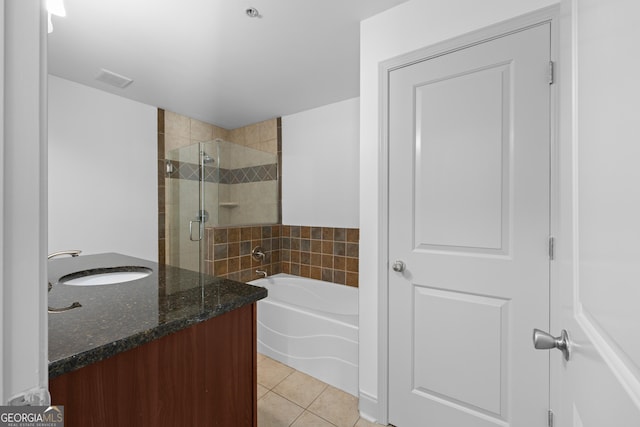 1102 Madison Ln SE, Smyrna, GA 30080 - full bathroom with a stall shower, a bath, tile patterned flooring, and vanity