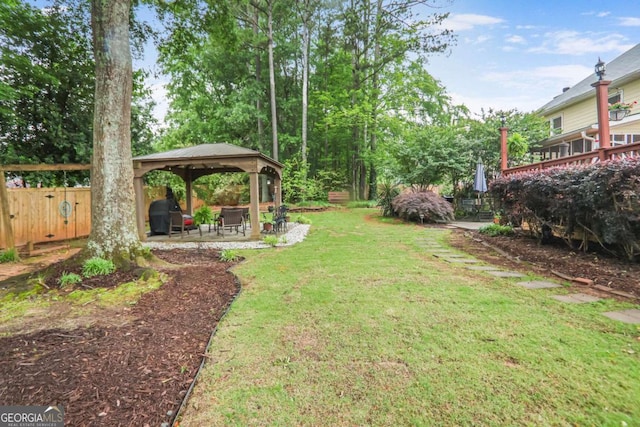view of yard with a gazebo and a patio area